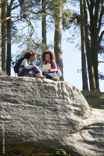 Young Couple Resting During Countryside Hike