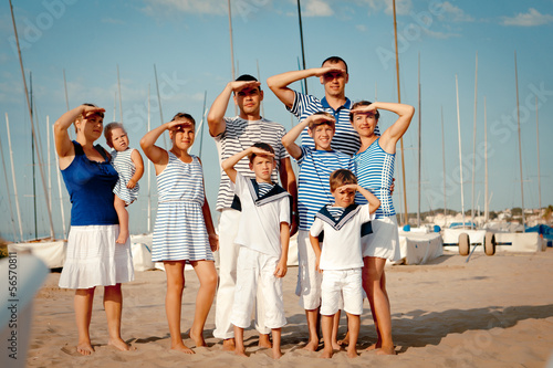 Portrait of happy family near yacht © rimmdream