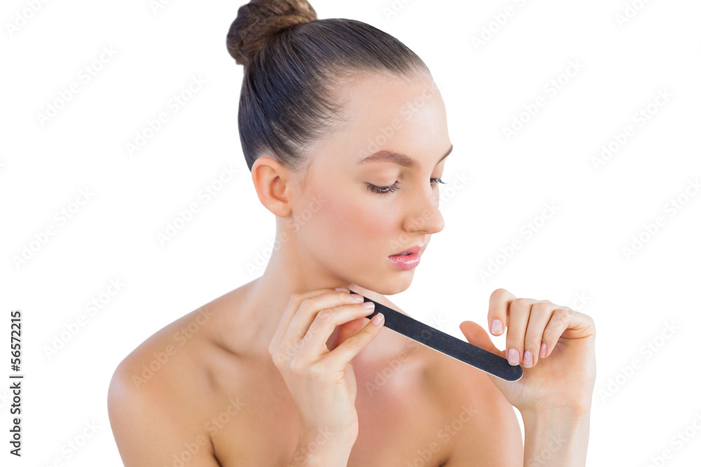 Obraz premium Young model with nail file