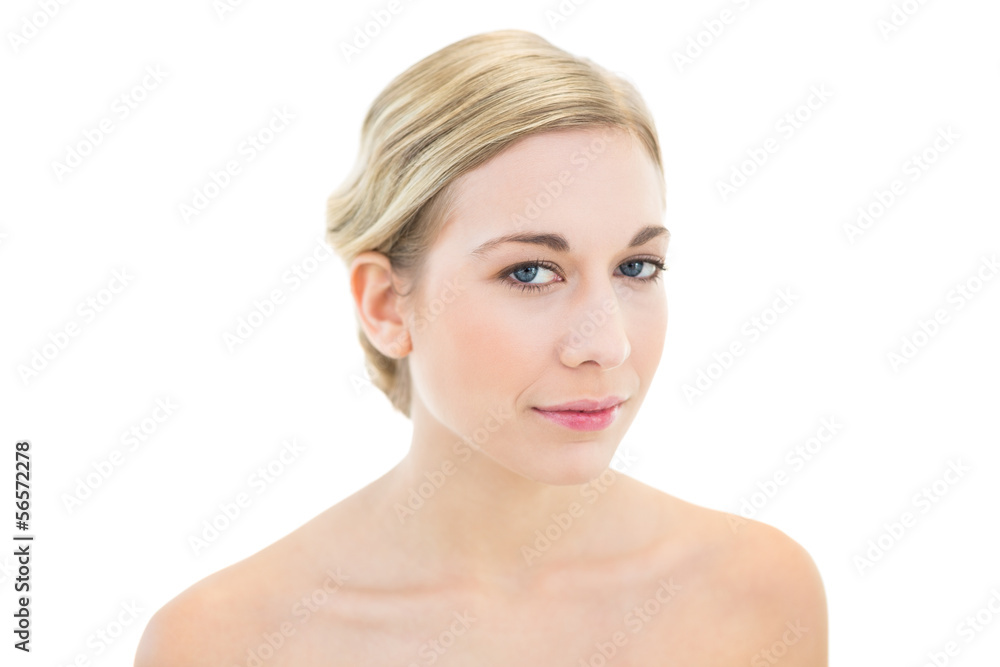 Thoughtful young blonde woman looking at camera Thoughtful young blonde woman looking at camera