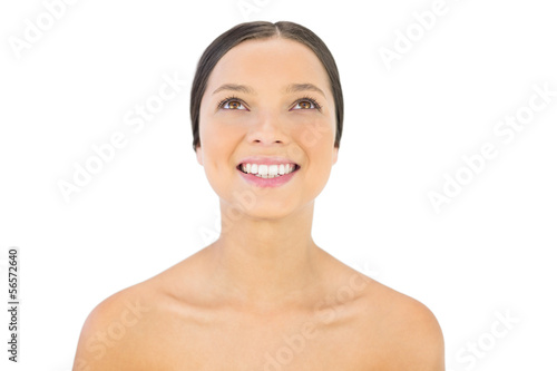 Smiling woman looking up