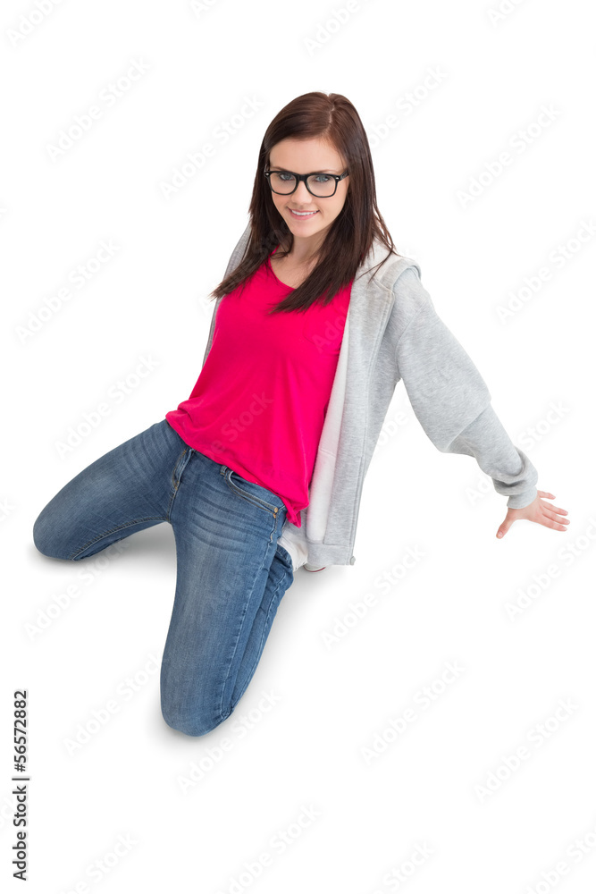 Cheerful young woman making hip hop pose Cheerful young woman making hip hop pose