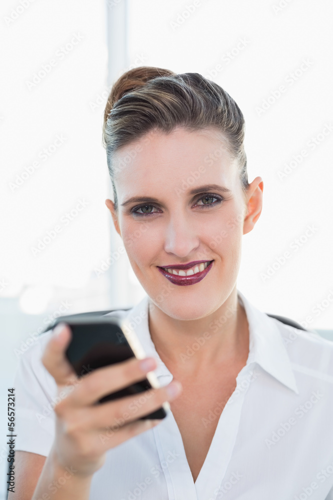 Close up view of businesswoman using smartphone Close up view of businesswoman using smartphone