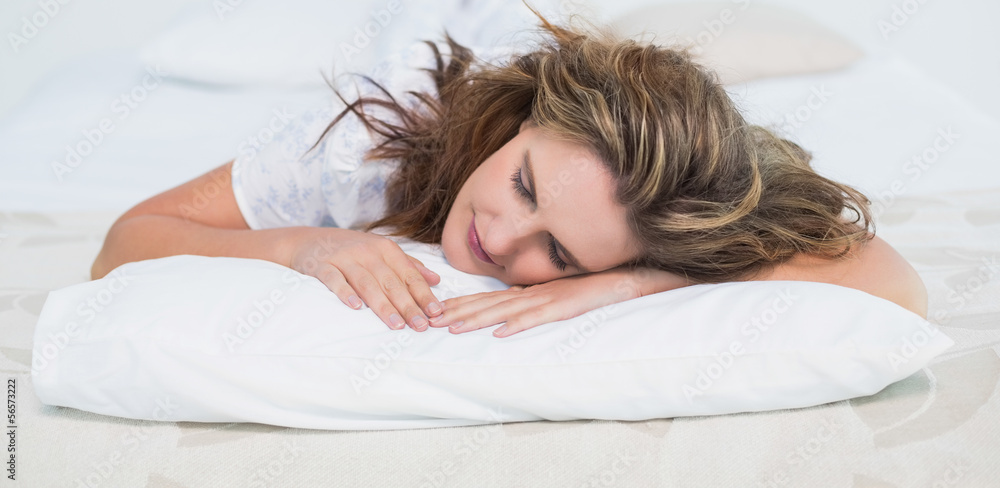 Woman sleeping in cosy bed Woman sleeping in cosy bed