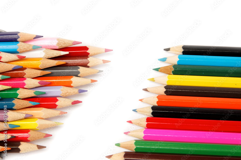 Colored pencils on a white background. Colored pencils on a white background.