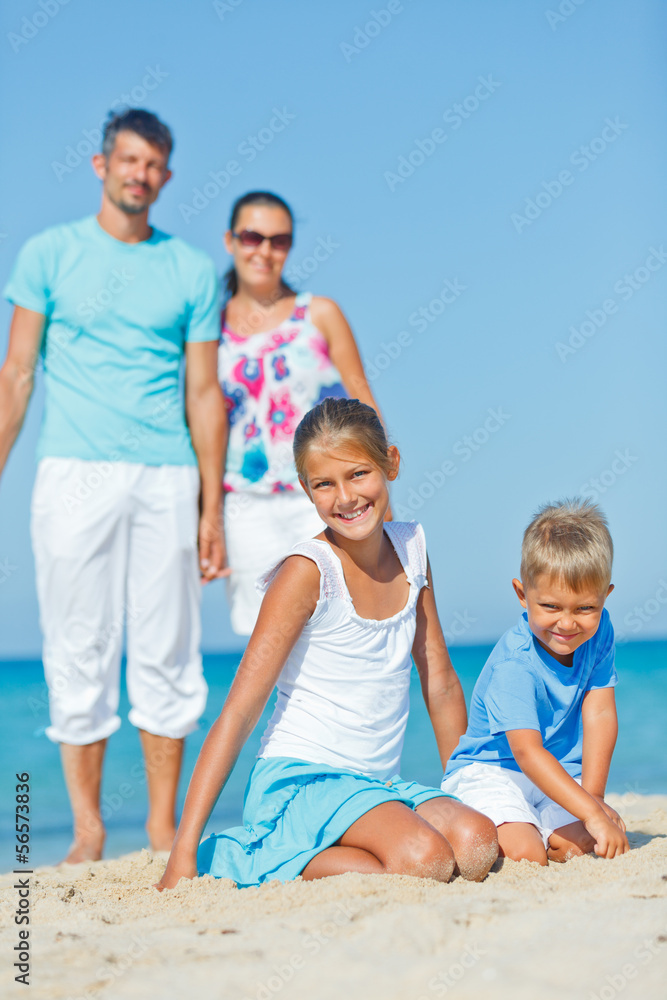 Fototapeta premium Family having fun on beach