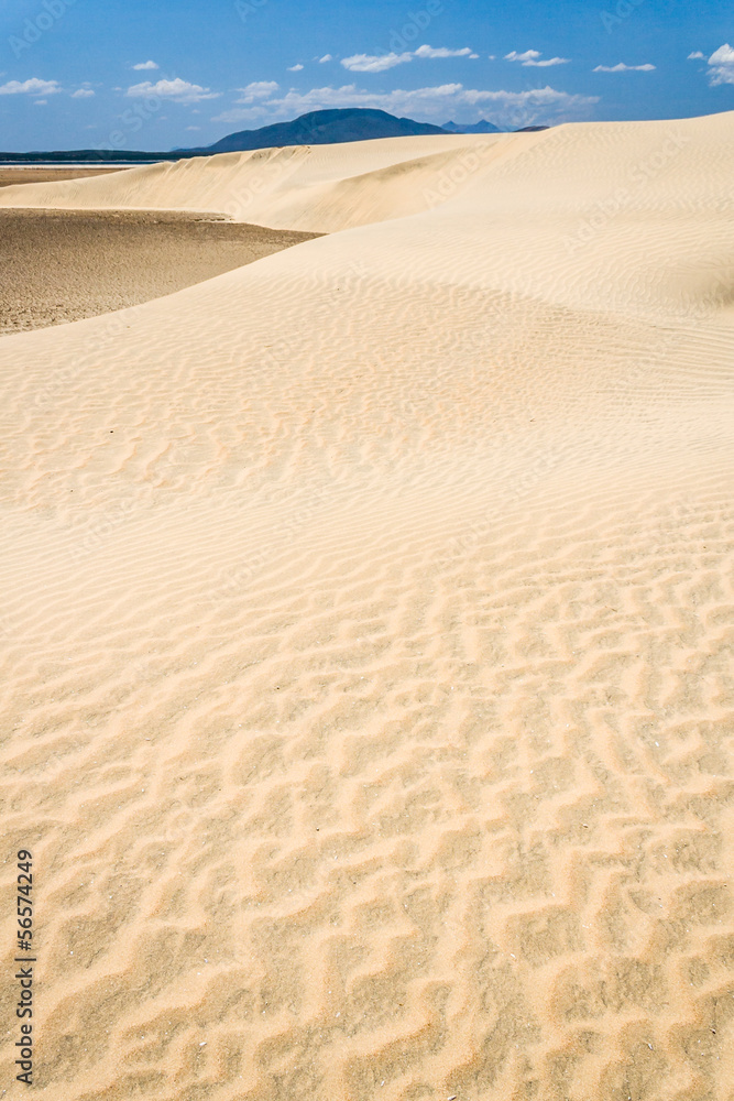 Sand dunes and lake