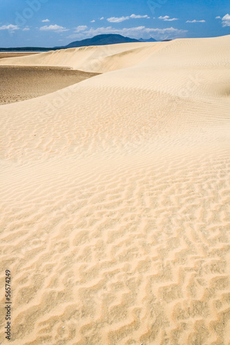 Sand dunes and lake