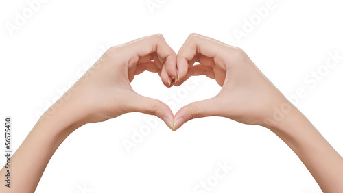 Female hands shaping a heart symbol on white backgroundStock Pho