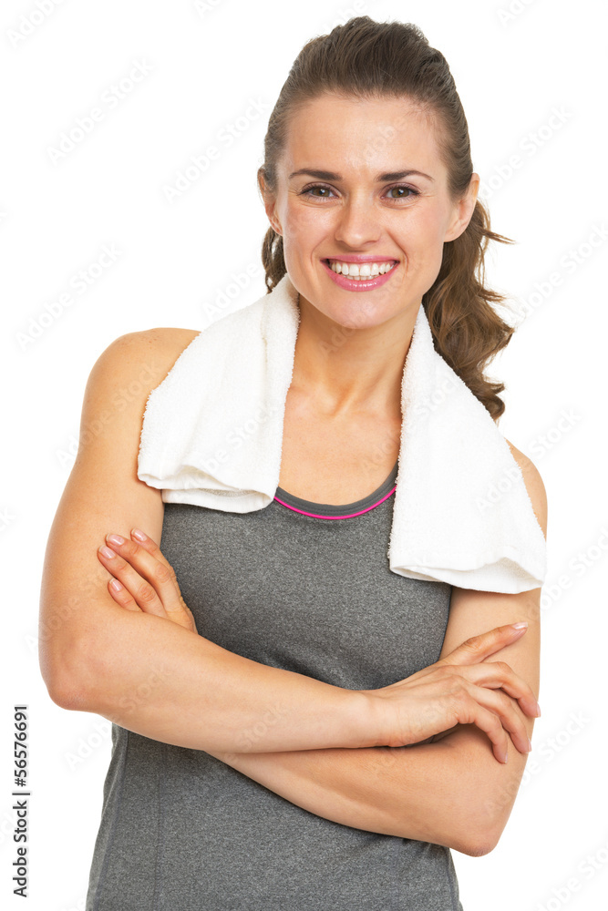 Portrait of happy fitness young woman with towel