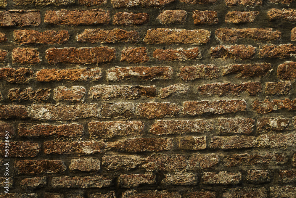 Naklejka premium red brick wall texture grunge background with vignetted corners, may use to interior design