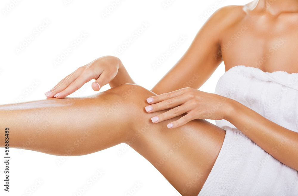 Fototapeta premium Applying moisturizer cream