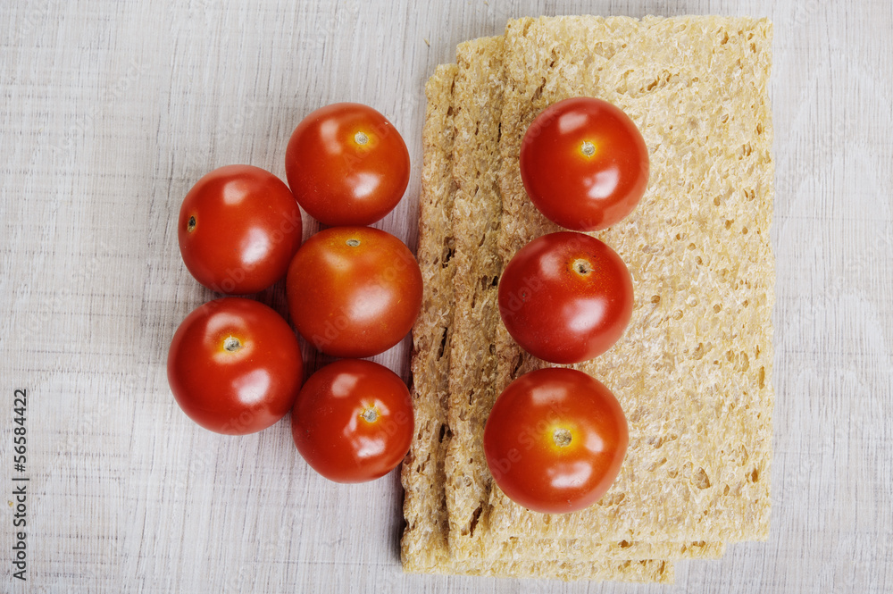 Pieces of toast and tomatoes Pieces of toast and tomatoes