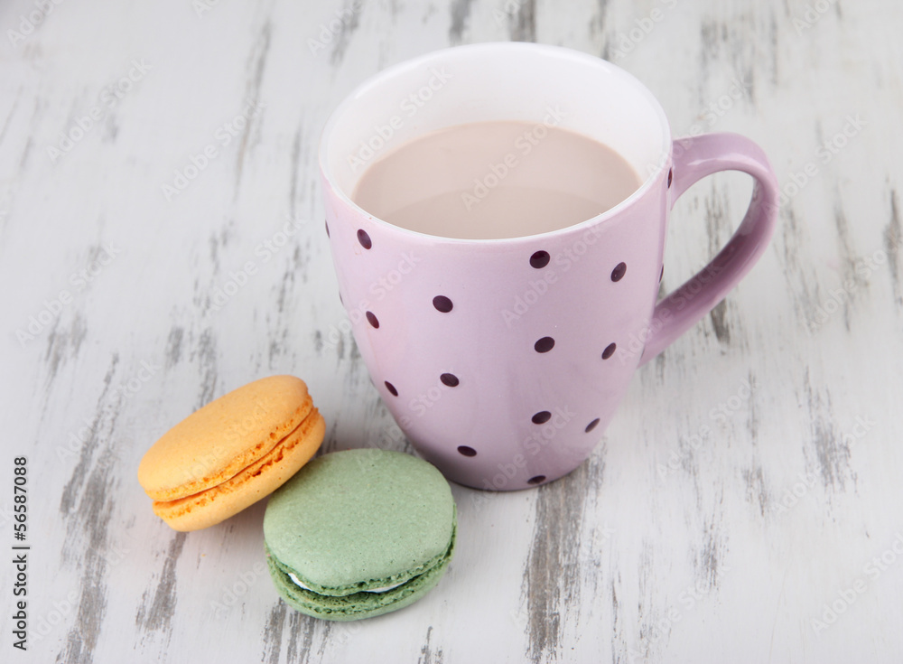 Cocoa drink, macaroni and cocoa beans on wooden background Cocoa drink, macaroni and cocoa beans on wooden background