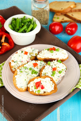 Sandwiches with cottage cheese and greens