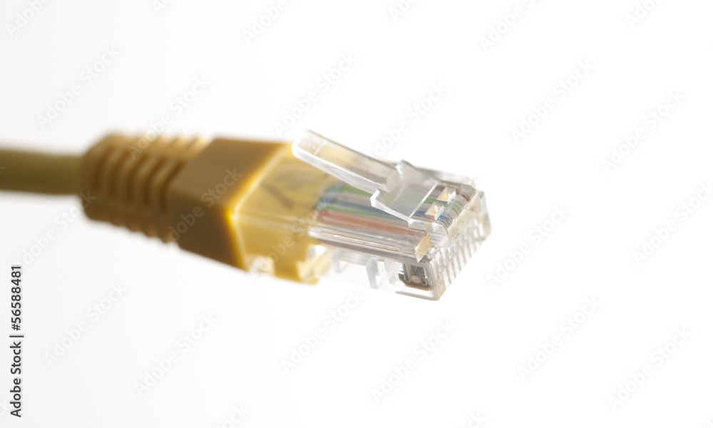 Yellow network cable with RJ45 connector on white background Yellow network cable with RJ45 connector on white background