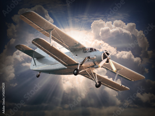 Retro style picture of the biplane. Transportation theme.