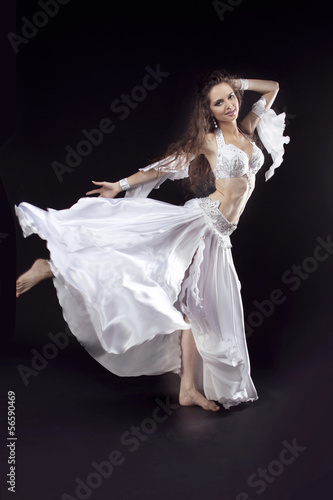 Beautiful woman belly dancer. Arabian oriental professional arti