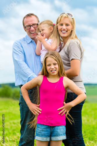 Happy Family in the meadow