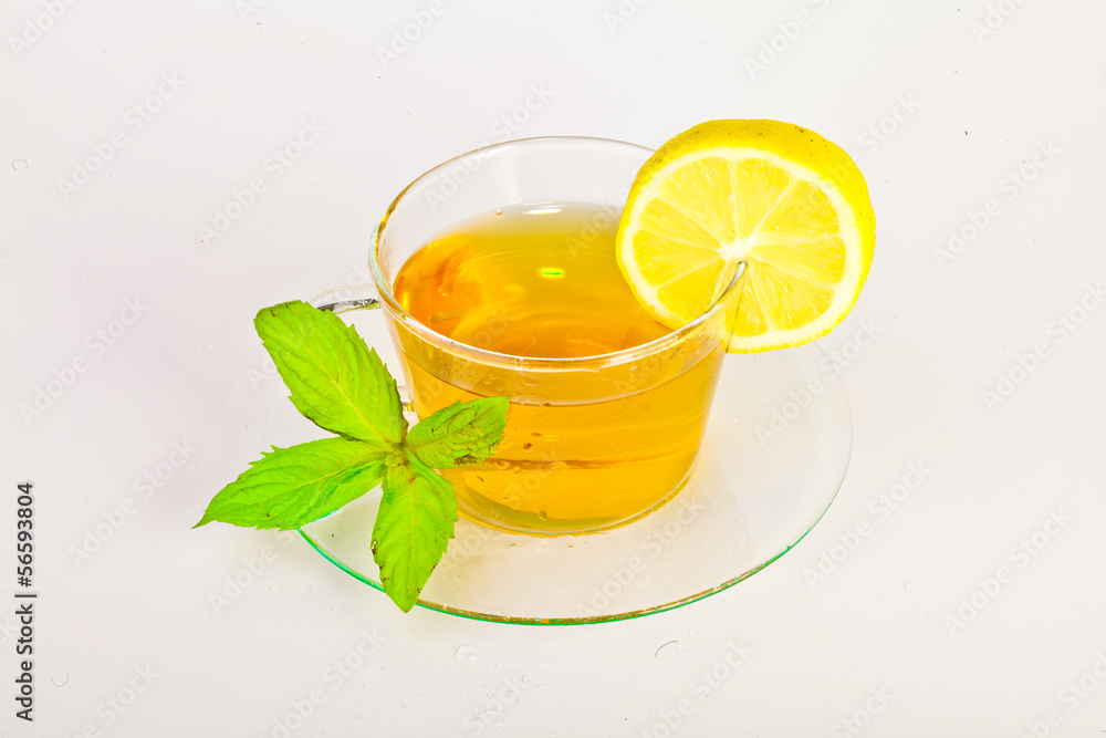 tea in cup with leaf mint and lemon tea in cup with leaf mint and lemon