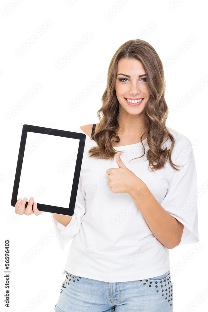 Attractive teenage girl showing tablet computer and thumb up Attractive teenage girl showing tablet computer and thumb up