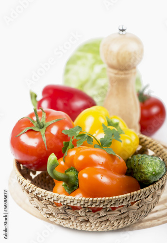 Vegetables on a white background. Cabbage, cucumber, tomato,