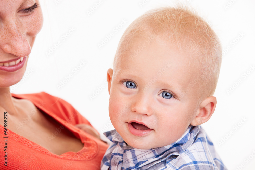 Cropped view of young Caucasian woman and her baby son Cropped view of young Caucasian woman and her baby son