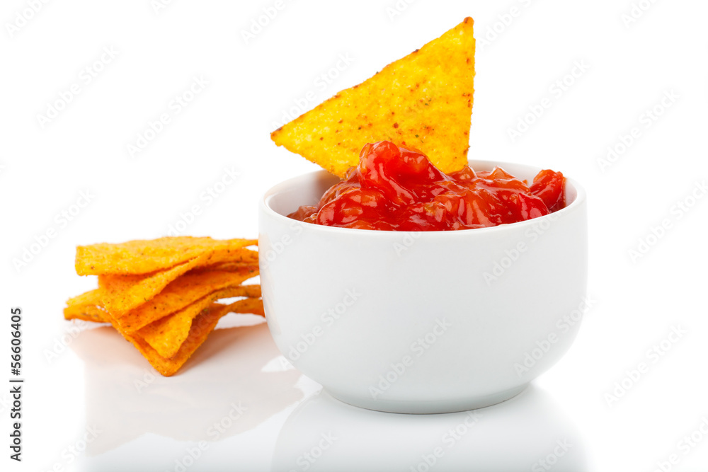 Nachos corn chips with fresh salsa isolated on white Nachos corn chips with fresh salsa isolated on white