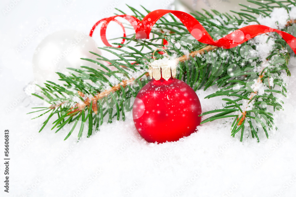 Christmas balls and fir branches on a snow background. Christmas balls and fir branches on a snow background.