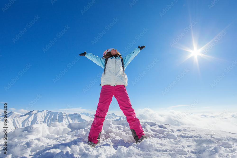 Hiker in winter Caucasus mountains