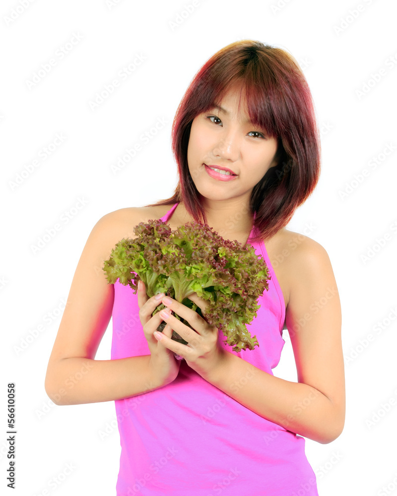 Isolated Young Asian woman with vegetable Isolated Young Asian woman with vegetable