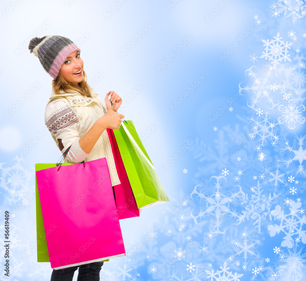 Girl with bags on winter background Girl with bags on winter background