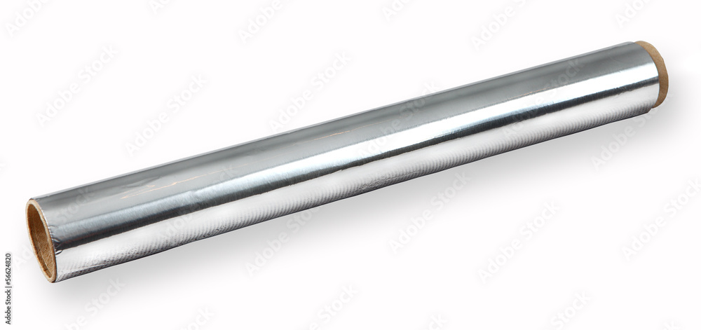 Food foil in thin, long roll. Isolated on white. Food foil in thin, long roll. Isolated on white.