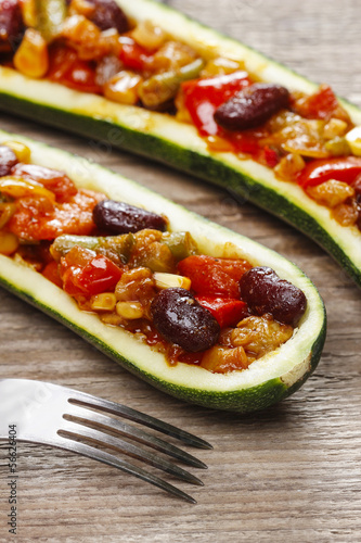 Zucchini stuffed with vegetable salad. Selective focus