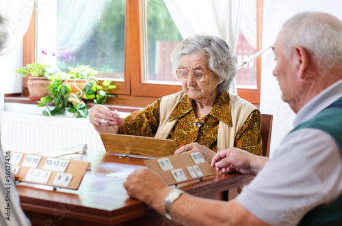 Senior people playing rummy