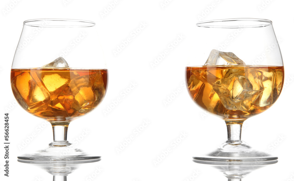 Brandy glasses with ice isolated on white Brandy glasses with ice isolated on white