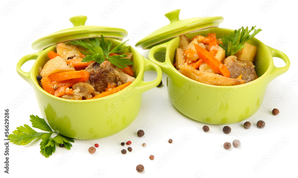Homemade beef stir fry with vegetables in color pans, isolated Homemade beef stir fry with vegetables in color pans, isolated