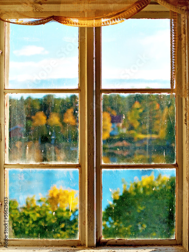 Autumn landscape seen through window