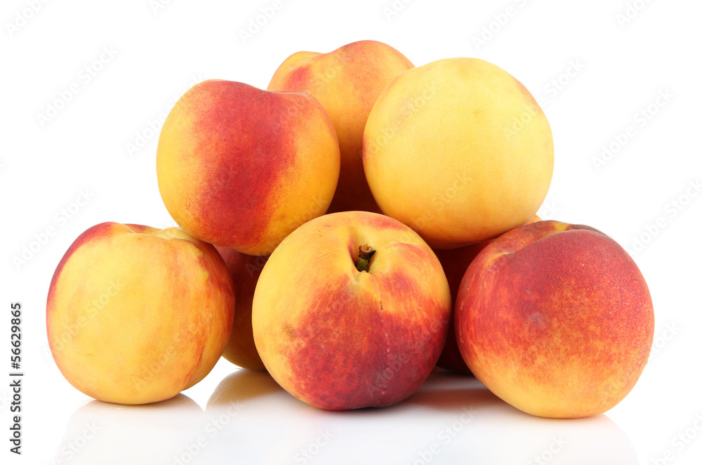Ripe sweet peaches, isolated on white Ripe sweet peaches, isolated on white