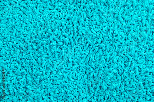 Fleecy blue pillow close-up background