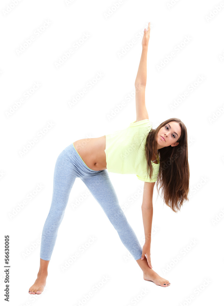 Young beautiful fitness girl doing yoga exercise isolated Young beautiful fitness girl doing yoga exercise isolated