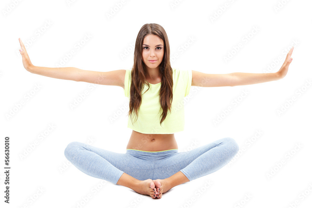 Young beautiful fitness girl doing yoga exercise isolated Young beautiful fitness girl doing yoga exercise isolated