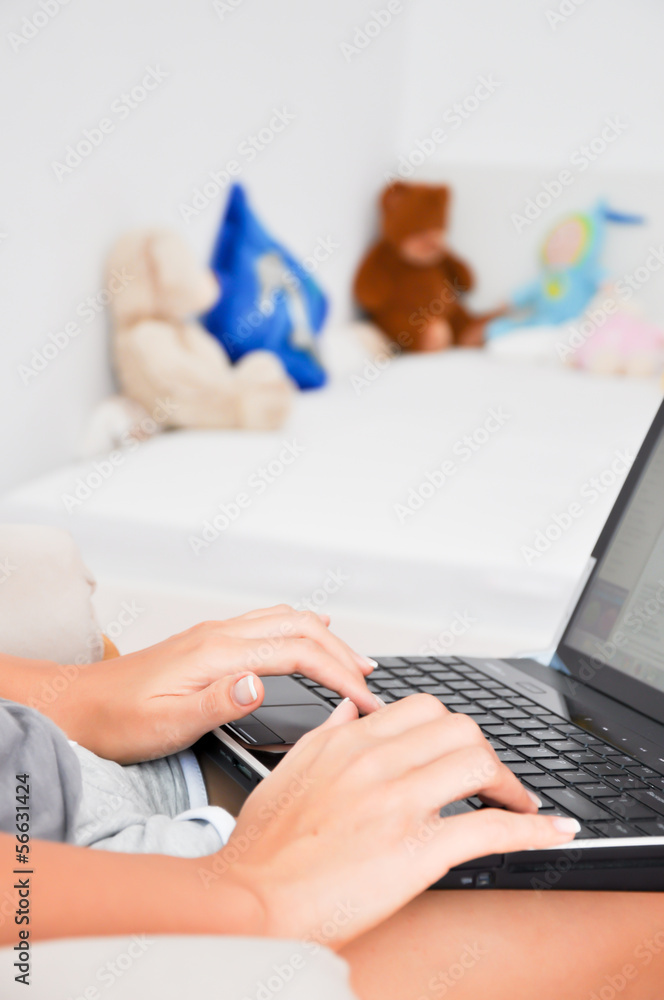 Fototapeta premium woman or young mother working from home