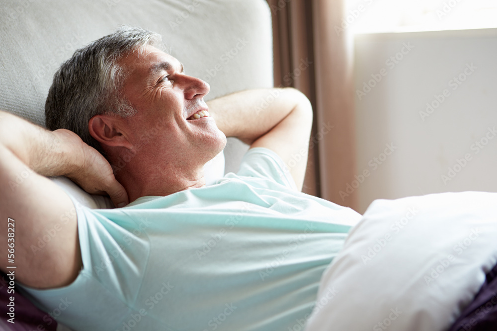 Middle Aged Man Waking Up In Bed Middle Aged Man Waking Up In Bed