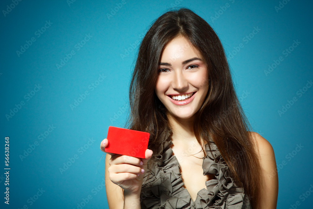 beautiful friendly smiling confident girl showing red card in ha beautiful friendly smiling confident girl showing red card in ha