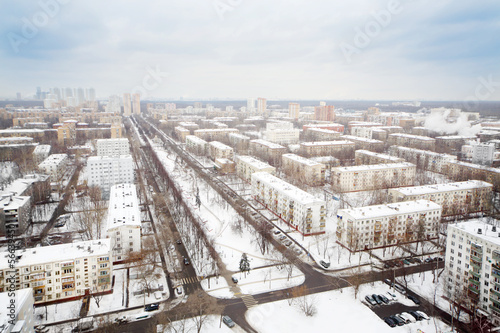 Streets and residential buildings in district at winter