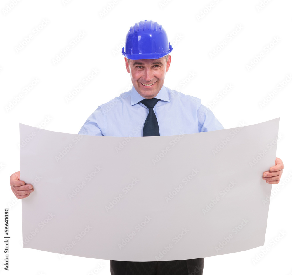 senior engineer holding a spread project and smiling senior engineer holding a spread project and smiling