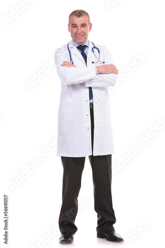 full body picture of an old doctor with arms crossed