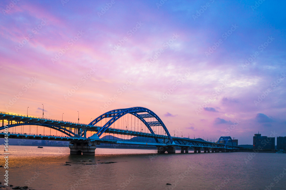 Fototapeta premium night bridge with sunset