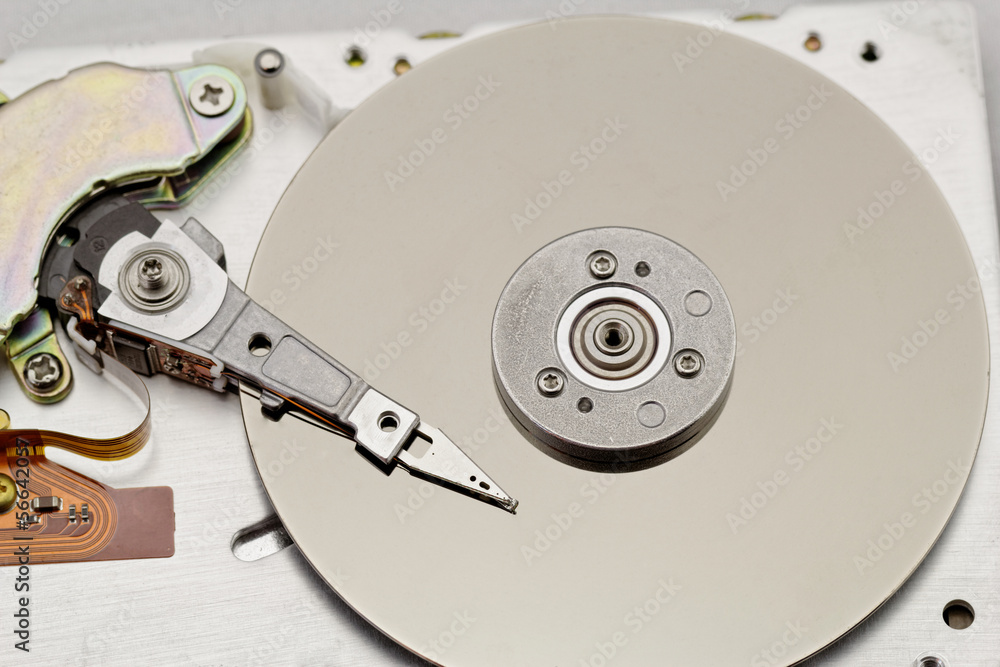 Open computer hard drive on white background Open computer hard drive on white background